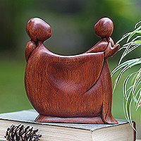 Wood sculpture, 'Daughter's Happiness' - Hand-Carved Suar Wood Sculpture with a Polished Finish