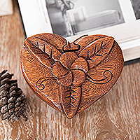 Wood puzzle box, 'Frangipani Challenge' - Hand-Carved Floral Brown Suar Wood Puzzle Box from Bali