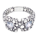 Blue topaz band ring, 'Loyal Vision' - Bubble-Patterned Band Ring with Faceted Blue Topaz Gems