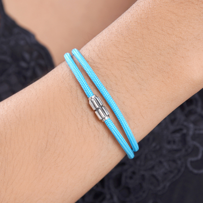 Sterling silver pendant cord bracelet, 'Heaven Minimalism' - Sky Blue Nylon Cord Bracelet with Sterling Silver Accent