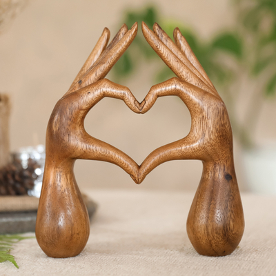 Wood sculpture, 'Loving Hand' - Hand-Carved Inspirational Romantic Suar Wood Sculpture