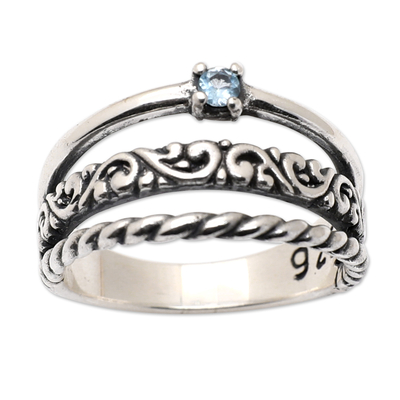 Blue topaz single stone ring, 'Jungle's Loyal Embrace' - Traditional Single Stone Ring with Faceted Blue Topaz Jewel