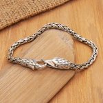 Sterling silver chain pendant bracelet, 'Bravery Feathers' - Sterling Silver Basketweave Chain Bracelet with Eagle Motif