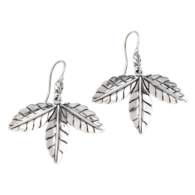 Sterling silver dangle earrings, 'Celestial Foliage' - Polished Sterling Silver Leafy Dangle Earrings from Bali