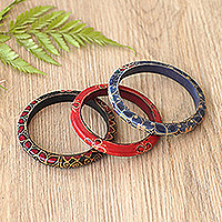 Batik wood bangle bracelets, 'Spring Trinity' - Set of 3 colourful Floral Batik Wadang Wood Bangle Bracelets
