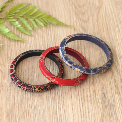 Batik wood bangle bracelets, 'Spring Trinity' - Set of 3 colourful Floral Batik Wadang Wood Bangle Bracelets