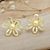 Gold-plated button earrings, 'Eden Bouquet' - Brushed-Satin Finished 18k Gold-Plated Button Earrings