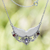 Amethyst and garnet pendant necklace, 'Celestial Wings' - Wing-Themed Pendant Necklace with Amethyst and Garnet Gems (image 2) thumbail