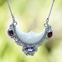 Amethyst and garnet pendant necklace, 'Nocturnal Aura' - Handcrafted Sterling Silver Moon Necklace with 1-Carat Gems