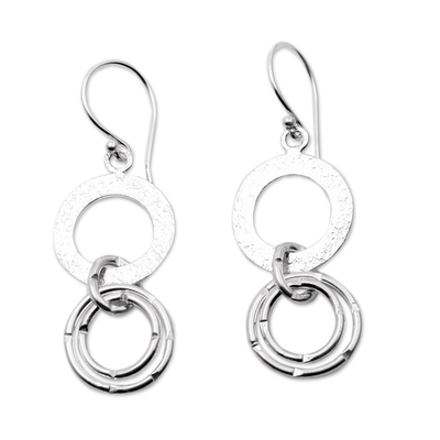 Sterling silver dangle earrings, 'Stellar Rings' - Modern Silver Dangle Earrings with Interlocking Rings