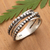 Sterling silver band ring, 'Cosmic Creation' - Polished Sterling Silver Band Ring Crafted in Bali (image 2) thumbail
