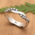 Sterling silver band ring, 'Magic Embraces' - Windy Polished Sterling Silver Band Ring Crafted in Bali (image 2) thumbail