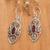 Garnet filigree dangle earrings, 'Perseverance Eyes' - Sterling Silver Filigree Dangle Earrings with Garnet Jewels