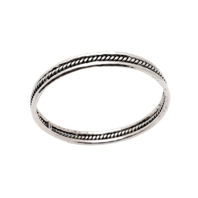 Sterling silver bangle bracelet, 'Charming Loop' - Sterling Silver Bangle Bracelet with Combination Finish