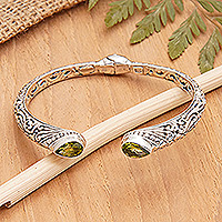 Peridot cuff bracelet, 'Green Tegalalang' - Polished Cuff Bracelet with Over-One-Carat Peridot Jewels