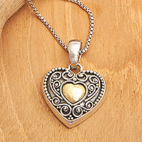 Gold-accented sterling silver pendant necklace, 'First Passion' - 18k Gold-Accented Heart-Shaped Pendant Necklace from Bali