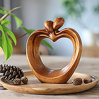 Wood sculpture, 'Sweet Passion' - Romantic Suar Wood Sculpture in an Apple and Heart Shape