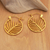 Gold-plated hoop earrings, 'Palm Flair' - 22k Gold-Plated Palm-Themed Hoop Earrings from Indonesia