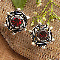 Garnet stud earrings, 'Red Universe' - Polished Garnet Stud Earrings Crafted from Sterling Silver