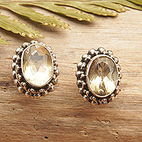 Citrine stud earrings, 'Yellow Maiden' - Sterling Silver Stud Earrings with Oval Citrine Gems