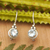 Blue topaz drop earrings, 'Unique Radiance' - Sterling Silver Drop Earrings with Round Blue Topaz Stone