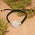 Sterling silver macrame pendant bracelet, 'Night Serenity' - Floral Black Macrame Bracelet with Polished Pendant