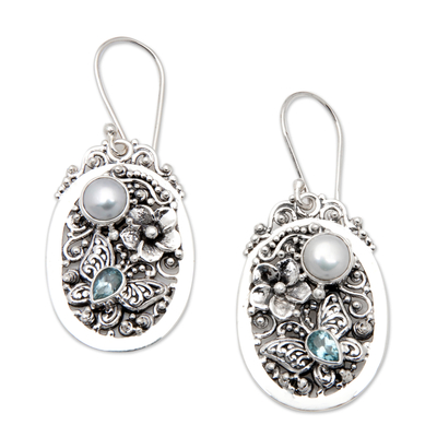 Blue topaz and cultured pearl dangle earrings, 'Garden of the Loyal' - Floral Blue Topaz and White Pearl Dangle Earrings from Bali
