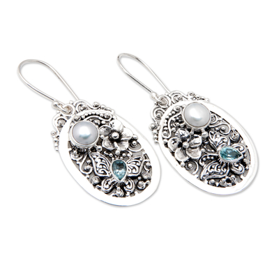 Blue topaz and cultured pearl dangle earrings, 'Garden of the Loyal' - Floral Blue Topaz and White Pearl Dangle Earrings from Bali