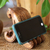 Wood phone stand, 'Marine Assistant in Brown' - Hand-Carved Natural Brown Jempinis Wood Octopus Phone Stand (image 2) thumbail