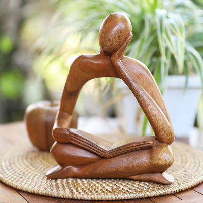 Abstract Wood Sculpture of Man Sitting Down with a Book - Thinker