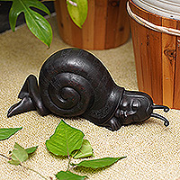 Wood sculpture, 'Tired Night Snail' - Hand-Carved Black Suar Wood Human-Like Snail Sculpture