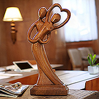 Wood sculpture, 'Dancing in Mind' - Hand-Carved Romantic Suar Wood Sculpture of Dancing Couple