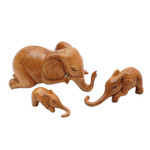 Wood hanging sculpture, 'Family Fun' (set of 3) - Hand-Carved Elephant Suar Wood Sculptures (Set of 3)