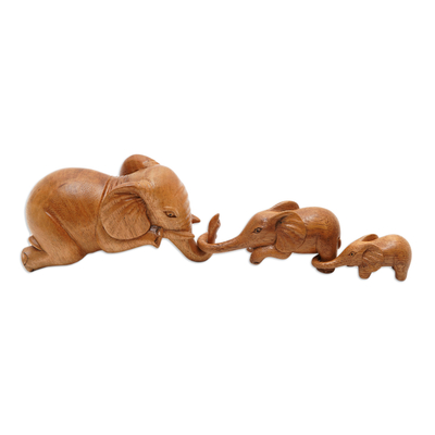 Wood sculptures, 'Family Fun' (set of 3) - Hand-Carved Elephant Suar Wood Sculptures (Set of 3)