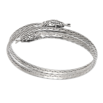 Sterling silver bangle bracelet, 'Snake Directions' - Traditional Snake-Themed Sterling Silver Bangle Bracelet