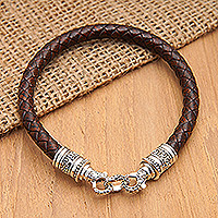 Men's leather braided wristband bracelet, 'Buddha Curl Wavy' - Men's Leather Braided Bracelet with Sterling Silver Clasp