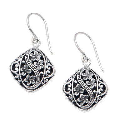 Sterling silver dangle earrings, 'Frangipani Spirits' - Diamond-Shaped Traditional Floral Dangle Earrings from Bali