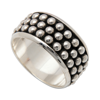 Men's sterling silver band ring, 'Hero's Dots' - Men's Polka-Dot Patterned Sterling Silver Band Ring