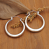 Sterling silver hoop earrings, 'Glow Today' - Minimalist-Inspired Round Sterling Silver Hoop Earrings