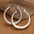 Sterling silver hoop earrings, 'Glow Today' - Minimalist-Inspired Round Sterling Silver Hoop Earrings (image 2b) thumbail