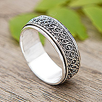 Men's sterling silver spinner ring, 'Twists and Fate' - Men's Polished Traditional Sterling Silver Spinner Ring