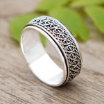 Men's sterling silver spinner ring, 'Twists and Fate' - Men's Polished Traditional Sterling Silver Spinner Ring