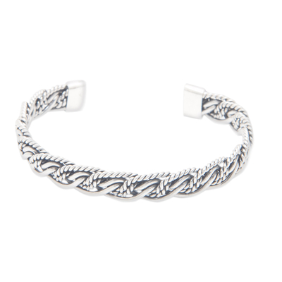 Sterling silver cuff bracelet, 'Double Encounters' - Polished Sterling Silver Cuff Bracelet with Rope Accents