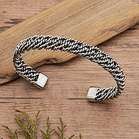 Sterling silver cuff bracelet, 'Myriad Encounters' - Polished Rope-Shaped Sterling Silver Cuff Bracelet