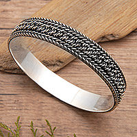 Sterling silver bangle bracelet, 'Braid Shake'