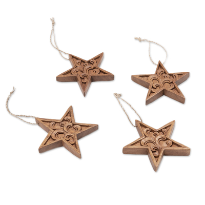 Wood ornaments, 'Morning Grace' (set of 4) - Set of 4 Traditional Star-Shaped Suar Wood Ornaments