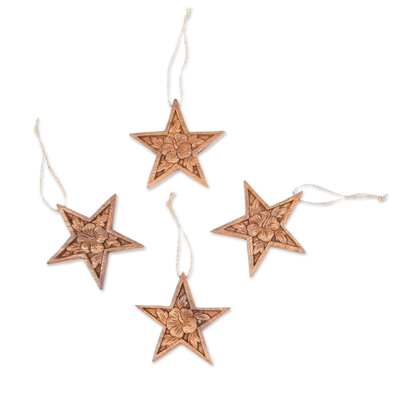 Wood ornaments, 'Hibiscus Grace' (set of 4) - Set of 4 Floral Star-Shaped Suar Wood Ornaments