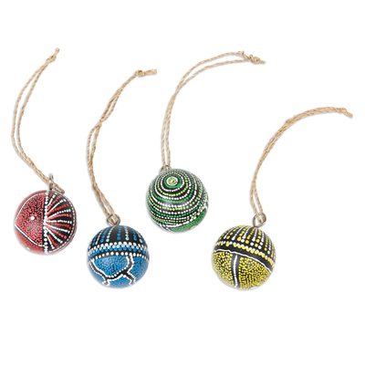 Wood ornaments, 'Island's Planets' (set of 4) - Set of 4 Handcrafted Round colourful Albesia Wood Ornaments