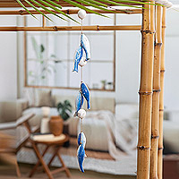 Wood mobile, 'Shoal of Depths' - Hand-Painted Dark Blue Fish-Themed Albesia Wood Mobile