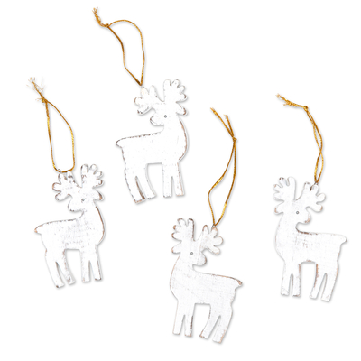 Wood holiday ornaments, 'Snowy Reindeer' (set of 4) - Set of 4 White Albesia Wood Holiday Reindeer Ornaments